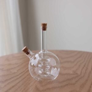 Round screw-on compact liquid bottle