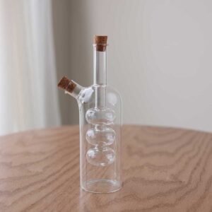Compact Cylindrical Liquid Bottle with Screw Design