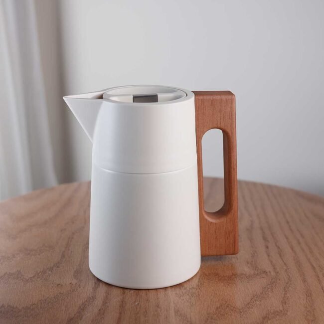 Beige Thermos with long wooden handle