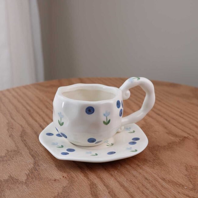 Handmade mug with blue cherries